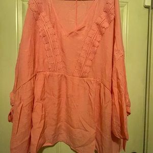 Be pretty in pink with this cute top. Perfect for the summer-light and cool!